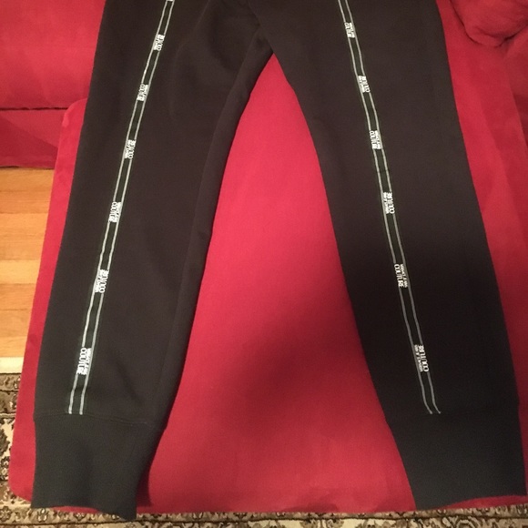 Versace Jeans Couture joggers. Size XL. Waist 36. Zipper pockets. Logo stripes. - Picture 5 of 6